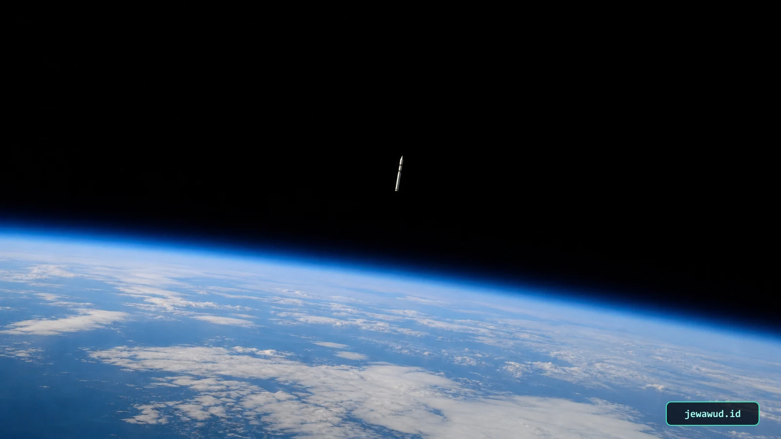 Small suborbital research rocket coasting above Earth's thin atmospheric limb