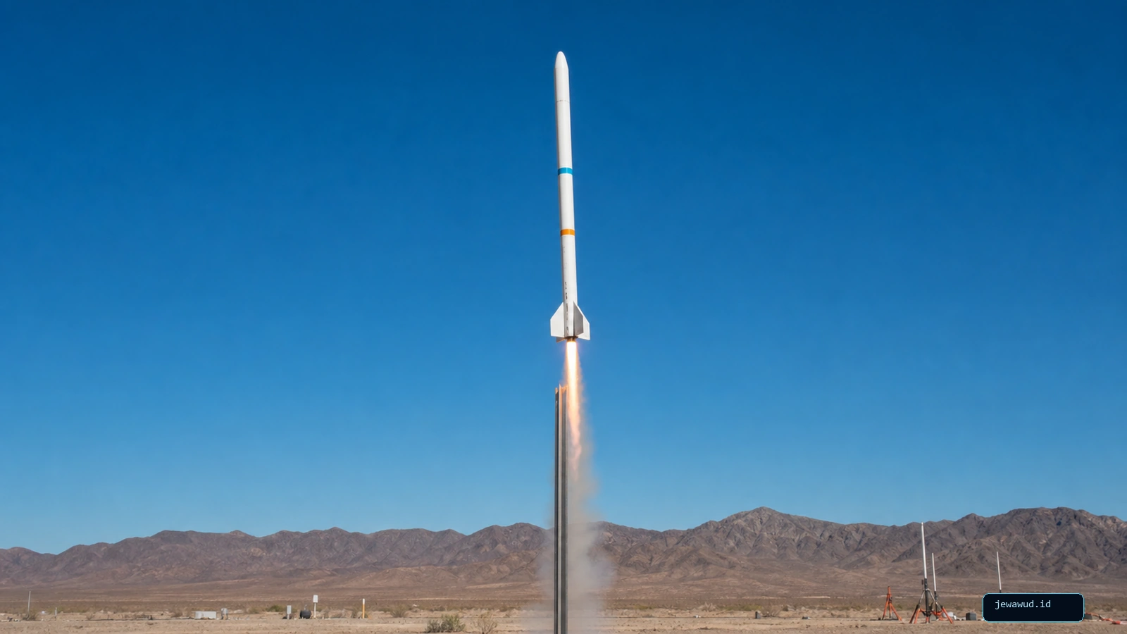 Small fin-stabilized research rocket ascending vertically over a remote daylight launch range